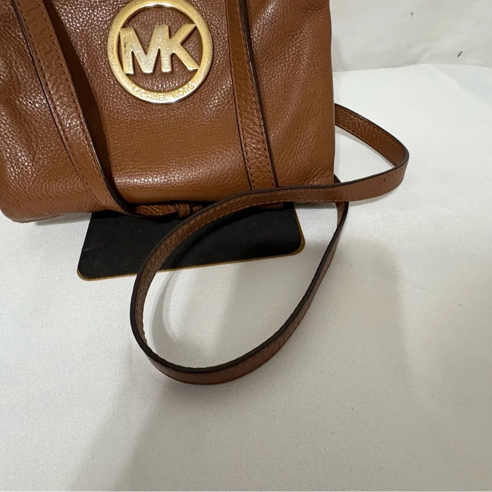 Michael Kors brown leather crossbody bag with gold-tone hardware